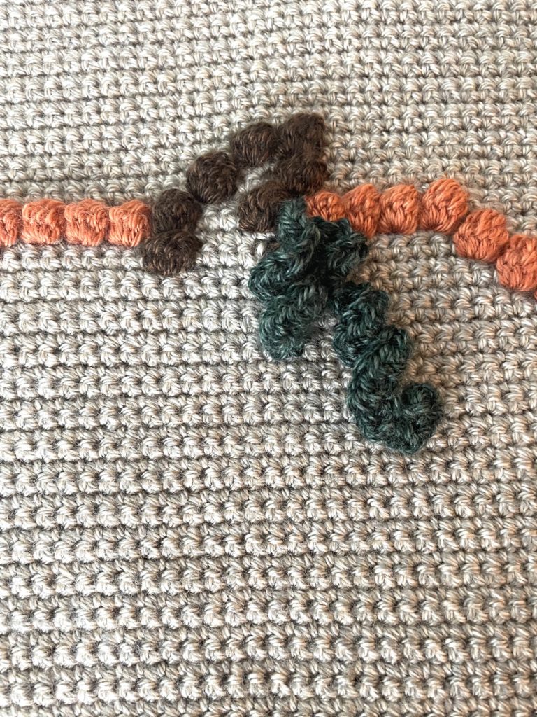 crochet pumpkin pillow