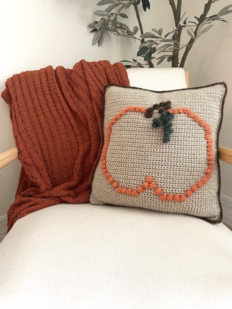 crochet pumpkin pillow